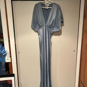 Evening gown, baby blue, gathered, draped, comfy feel. Worn to community event .